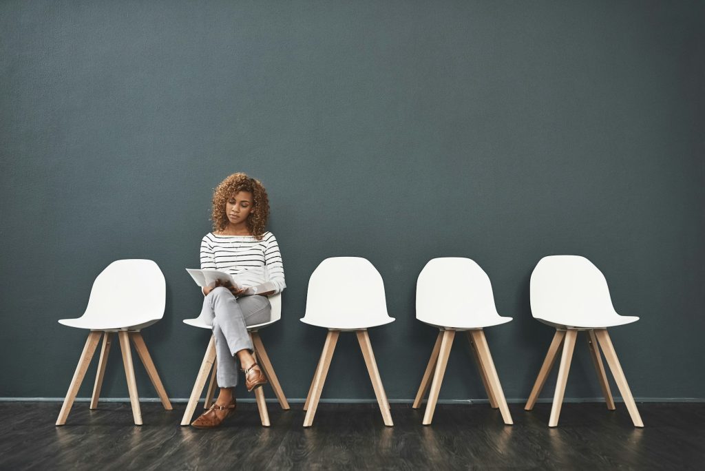 Young woman with an entrepreneurial mindset waiting for an interview 