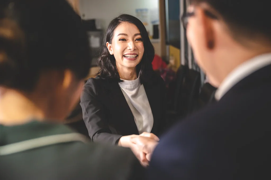 Creating a positive interview environment by greeting the candidate